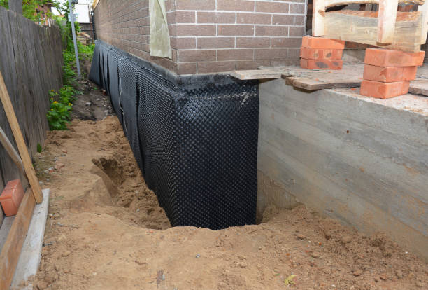 Happy homeowners after waterproofing job in Evensville